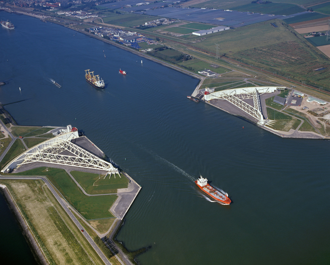 Hoek van Holland, Holland, September 25 - 1997: Historical aerial photo of the open Maeslandkering on the Nieuwe Waterweg to Rotterdam, Holland